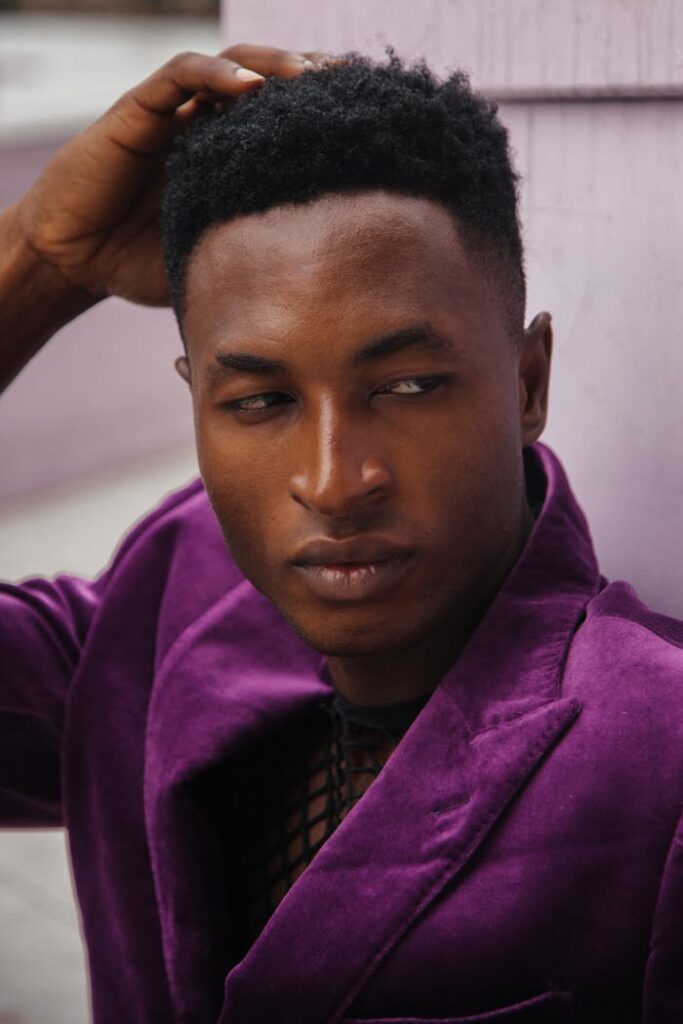 Close-Up Shot of a Man Wearing Violet Blazer